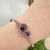 Magiczna biżuteria z miedzi i kamieni naturalnych jako amulet ochrony.