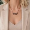 Unikatowa biżuteria miedziana z kamieniem ochronnym od Taika Jewelry.