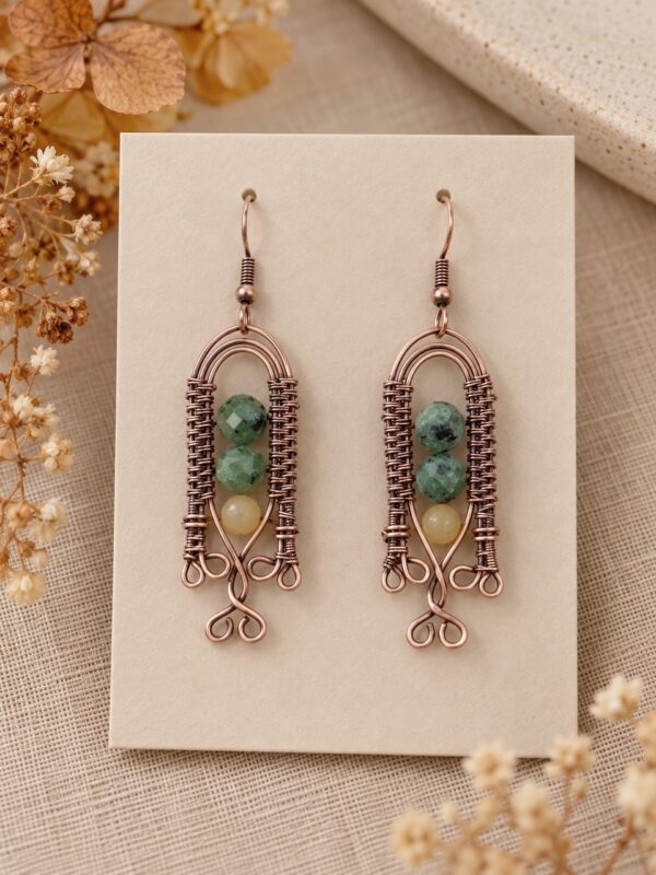 Miedziane kolczyki wire wrapping z naturalnym epidotem i miodowym topazem