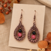 Miedziane kolczyki wire wrapping z czarnym turmalinem i rodonitem.